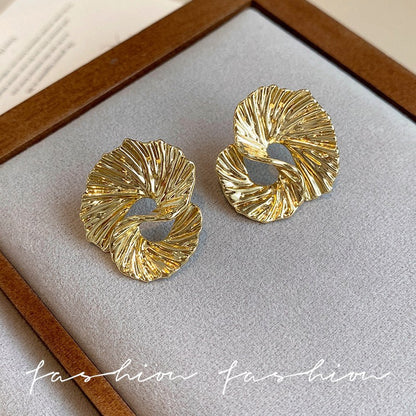 Silver Twirl Textured Statement Earrings